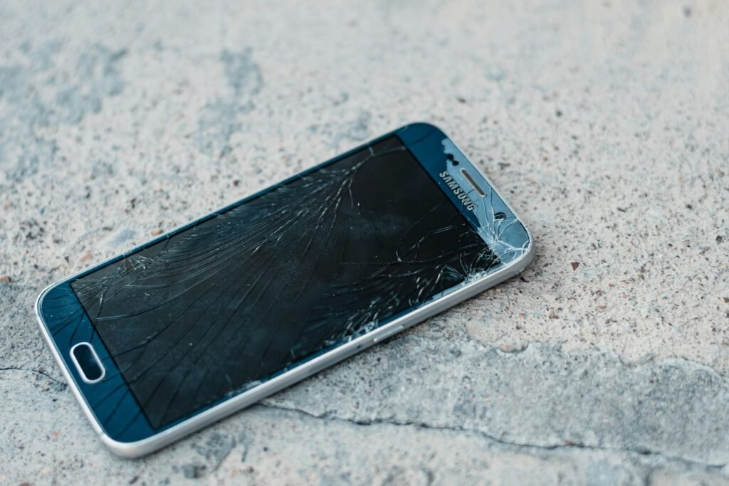 Samsung phone with a cracked screen